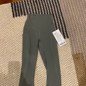 Size 0 align with pockets 23” olive - brand new !